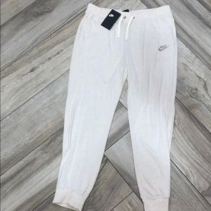 Light pink Nike sweat pants
